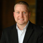 Headshot of Chris Fahy, real estate agent