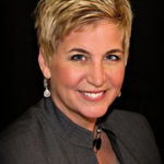Headshot of Heidi Powell, real estate agent