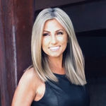 Headshot of Jackie Nedin, real estate agent