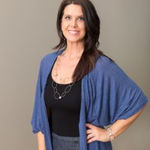 Headshot of Kelly Titus, real estate agent