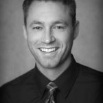 Headshot of Joshua Cottle, real estate agent