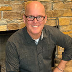 Headshot of Kenneth Collins, real estate agent