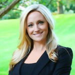 Headshot of Amy Seely, real estate agent