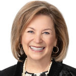 Headshot of Dee Evans, real estate agent