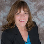 Headshot of Janet Lane, real estate agent