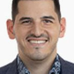 Headshot of Ryan Robbins, real estate agent
