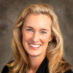 Headshot of Christine Grenney, real estate agent