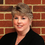 Headshot of Diana Brink, real estate agent