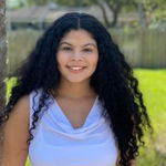 Headshot of Giulia Rodriguez, real estate agent