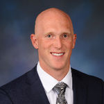 Headshot of Landon Anglin, real estate agent