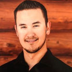 Headshot of Dillon Reed, real estate agent