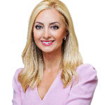 Headshot of Brittani Frankowiak, real estate agent