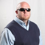 Headshot of Eric Hill, real estate agent