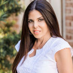 Headshot of Aimee Wine, real estate agent