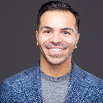 Headshot of Mike Delgado, real estate agent