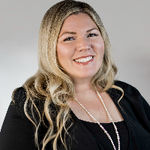 Headshot of Sarah Cave, real estate agent