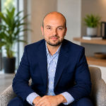 Headshot of Alan Greulich, real estate agent