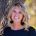 Headshot of Erin Strain, real estate agent
