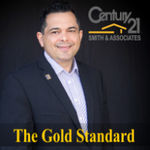 Headshot of Hector Mendes, real estate agent