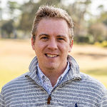 Headshot of Trace Sellers, real estate agent