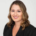 Headshot of Amber Stang, real estate agent