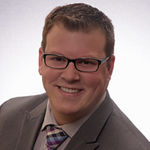 Headshot of Chris Feneis, real estate agent