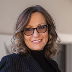 Headshot of Alex Norton, real estate agent