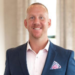 Headshot of Michael Janik, real estate agent