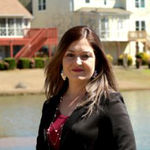Headshot of Heather Alam, real estate agent