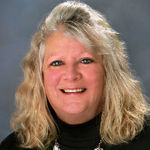 Headshot of Renee Irish, real estate agent