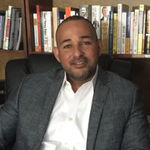Headshot of William Ramos, real estate agent
