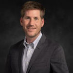Headshot of Andrew Sprenkel, real estate agent