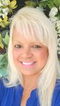 Headshot of Raka Raychaudhuri, real estate agent