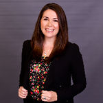 Headshot of Sarah Short, real estate agent