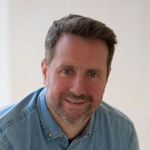 Headshot of Austin Kempf, real estate agent