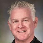 Headshot of Steve Pate, real estate agent