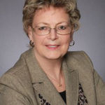 Headshot of Janice Nhare, real estate agent