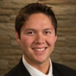 Headshot of Christopher Adams, real estate agent
