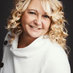 Headshot of Angela Stevens, real estate agent