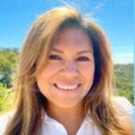 Headshot of Adriana Macias, real estate agent