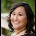 Headshot of Erin Pierce, real estate agent