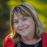Headshot of Laurie Mangen, real estate agent