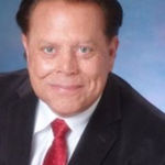 Headshot of Bud Caruso, real estate agent