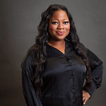 Headshot of Danielle Young, real estate agent