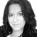 Headshot of Amanda West, real estate agent