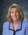 Headshot of Suzanne Roell-Carlson, real estate agent