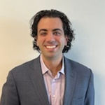 Headshot of Adam Max, real estate agent