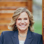 Headshot of Jami Stamm, real estate agent