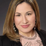 Headshot of Jasmina Tinoko, real estate agent