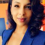 Headshot of Adrianne Edwards, real estate agent